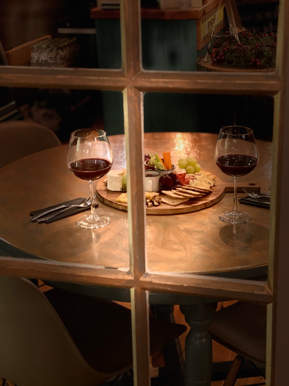 glass of red, glass of white, cheese board, friends for wine, cheese, crackers, olives, chorizo, meet for drink, meet for christmas