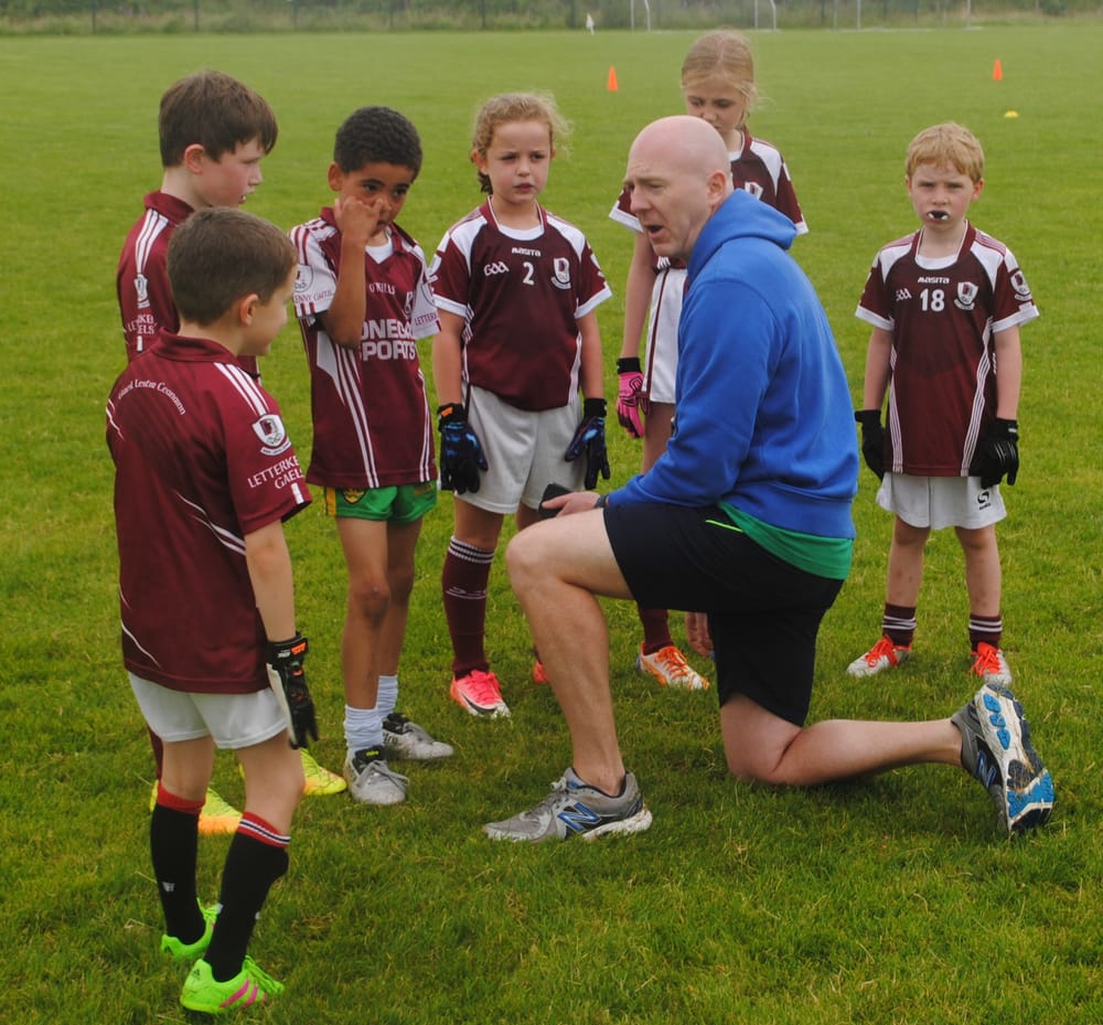 a group of boys in sports uniforms