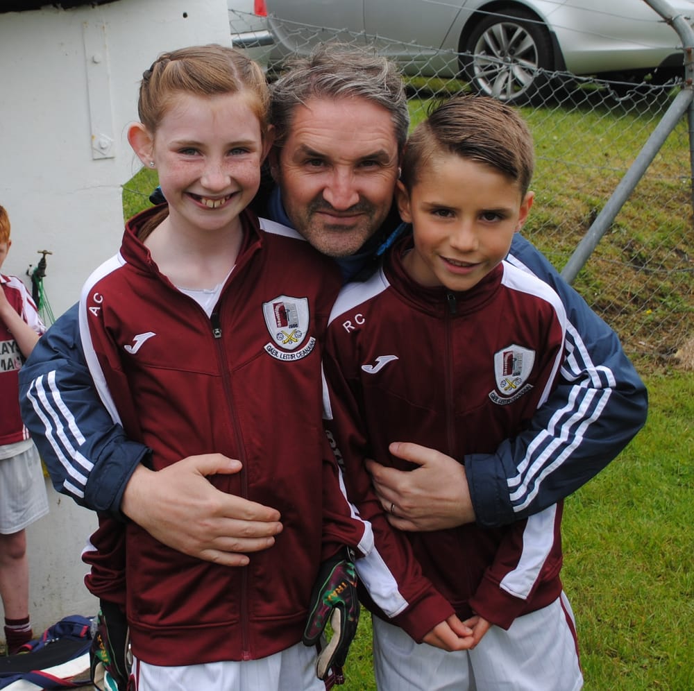 a person and two boys